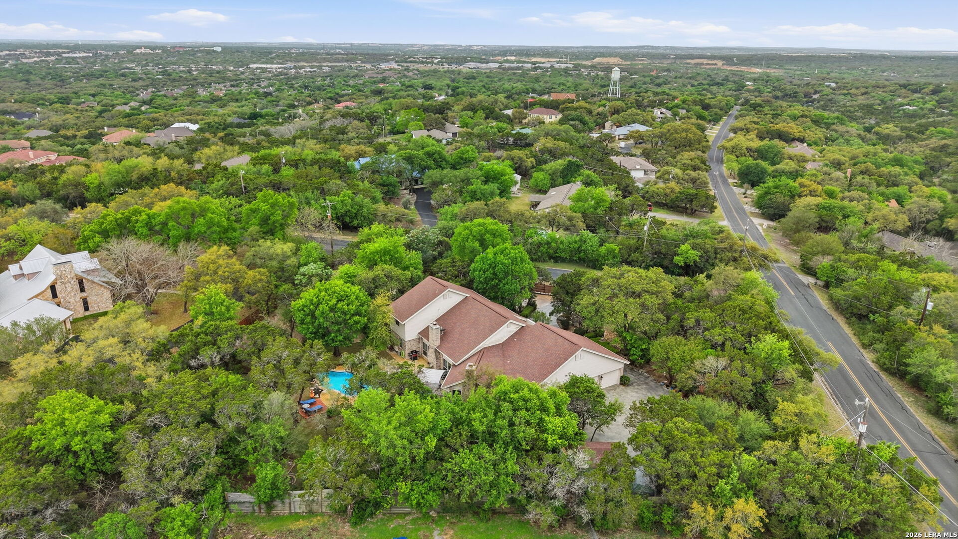 14502 Circle A Trail Helotes, TX 78023 - Photo 47 of 50 an aerial view of residential house with outdoor space and trees all around