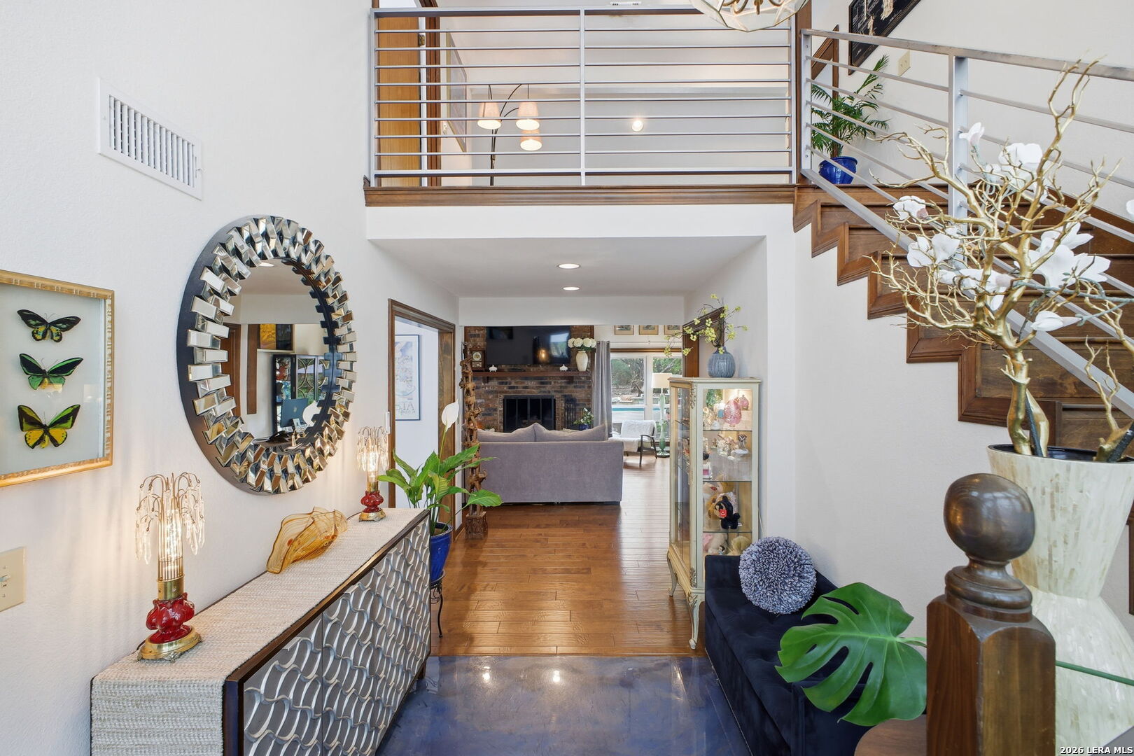14502 Circle A Trail Helotes, TX 78023 - Photo 7 of 50 a view of entryway and hall with wooden floor