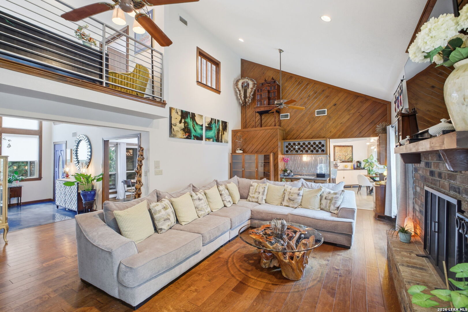 14502 Circle A Trail Helotes, TX 78023 - Photo 10 of 50 a living room with fireplace furniture and a wooden floor