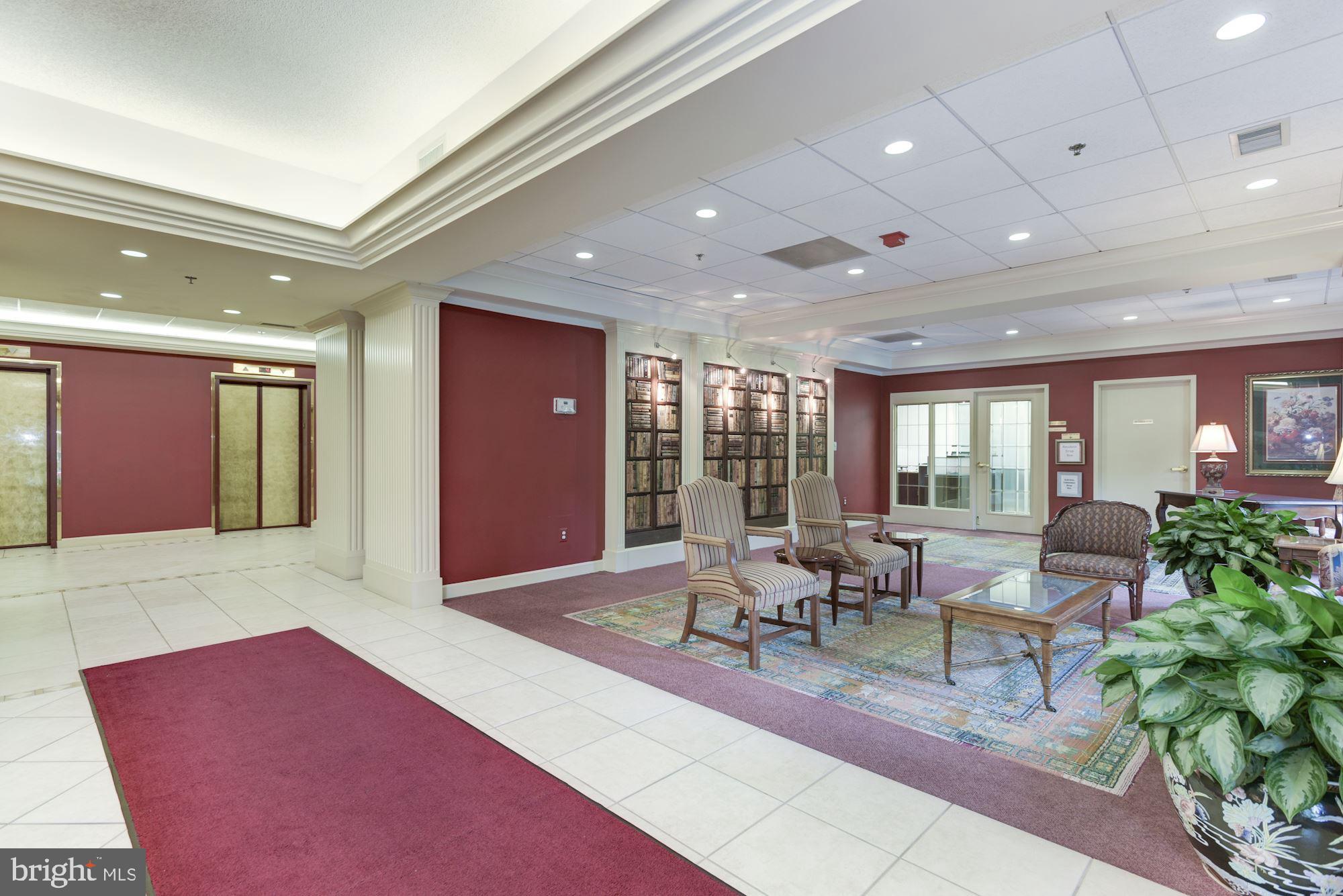 19385 Cypress Ridge Terrace, Unit 722 Leesburg, VA 20176 - Photo 2 of 10 a living room with furniture