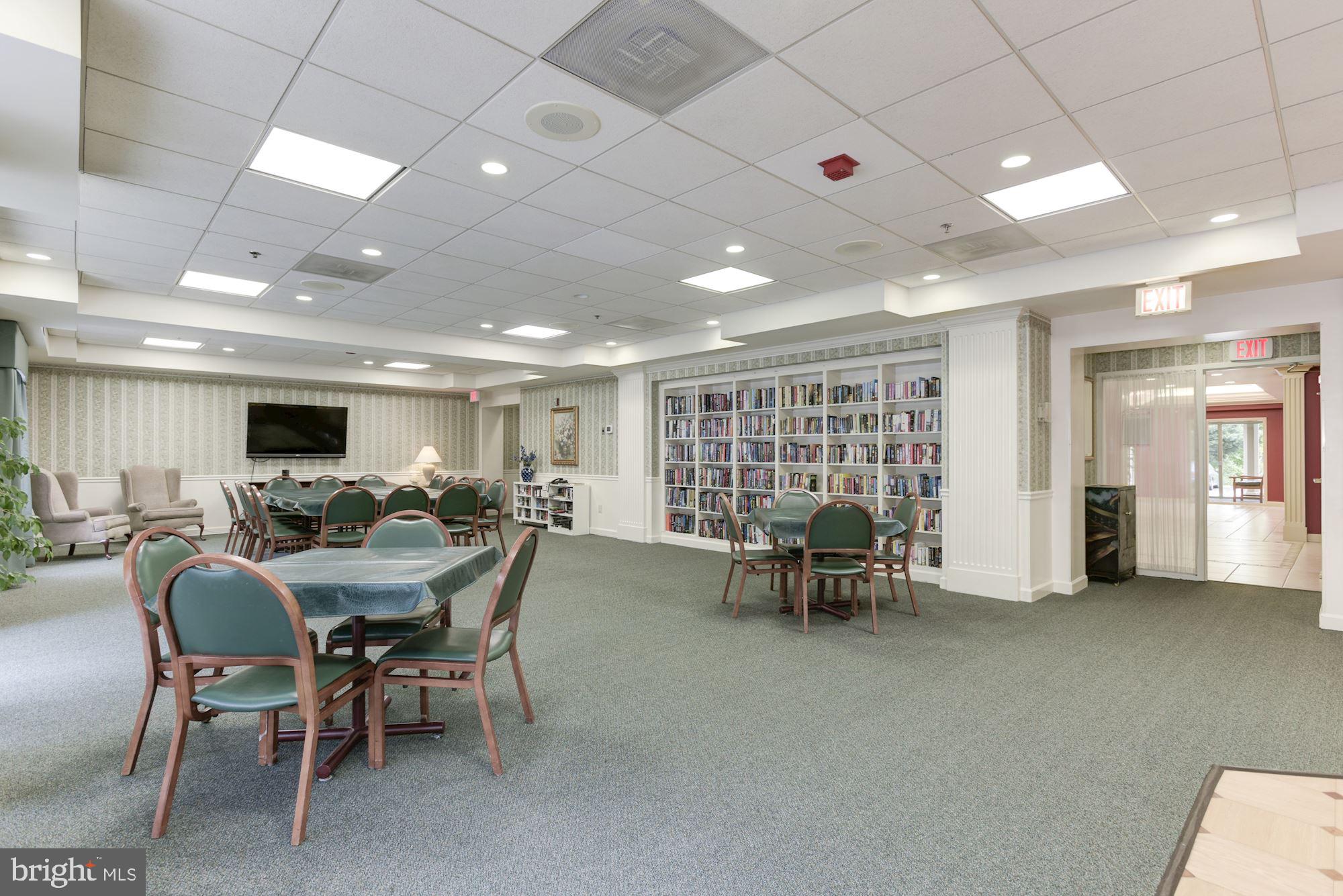 19385 Cypress Ridge Terrace, Unit 722 Leesburg, VA 20176 - Photo 6 of 10 a view of a dining room with furniture
