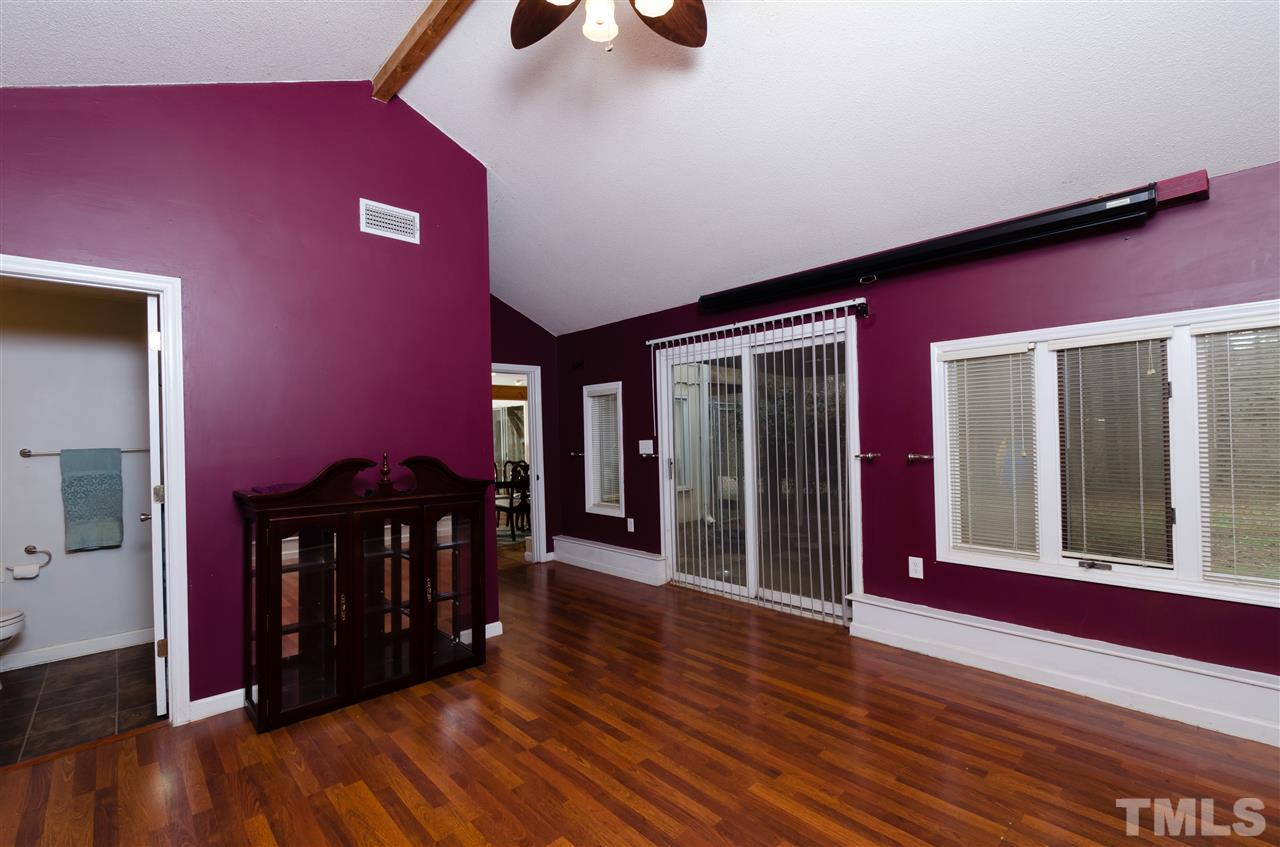 721 Locust Lane Raleigh, NC 27603 - Photo 12 of 22 a view of livingroom with furniture and wooden floor