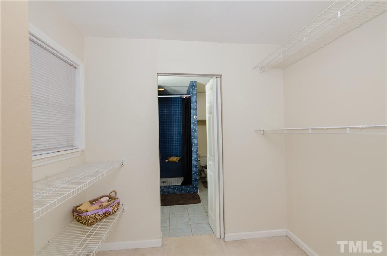 721 Locust Lane Raleigh, NC 27603 - Photo 16 of 22 a hallway with storage and utility