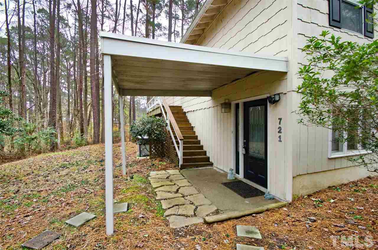 721 Locust Lane Raleigh, NC 27603 - Photo 18 of 22 a view of a entryway door of the house