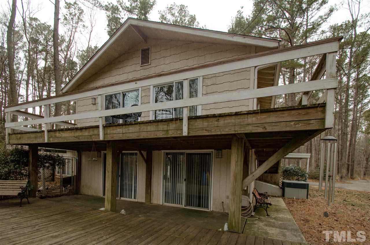 721 Locust Lane Raleigh, NC 27603 - Photo 4 of 22 a front view of a building with balcony