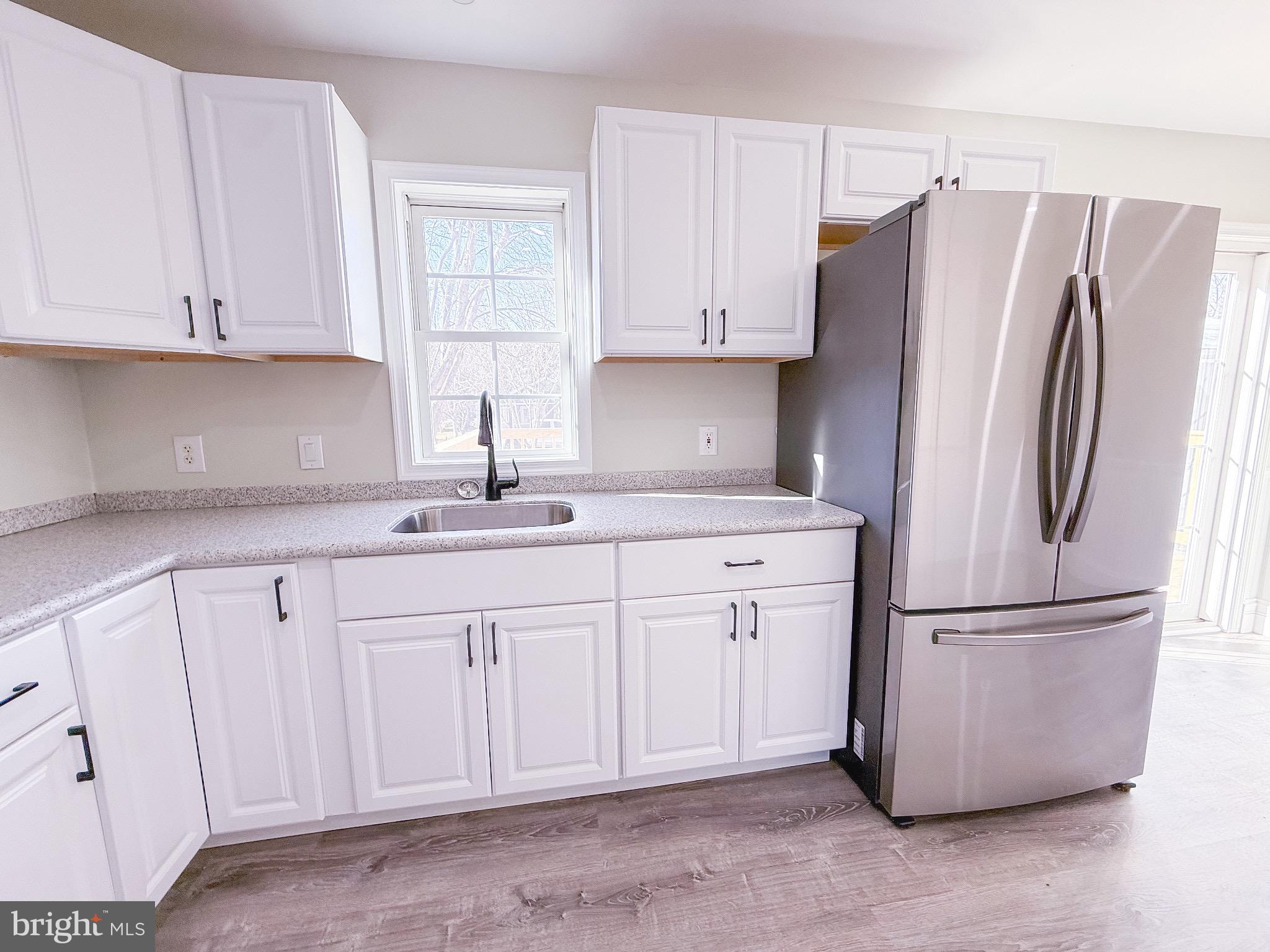 18558 Oak Road Bridgeville, DE 19933 - Photo 23 of 36 Modern kitchen with sleek appliances.