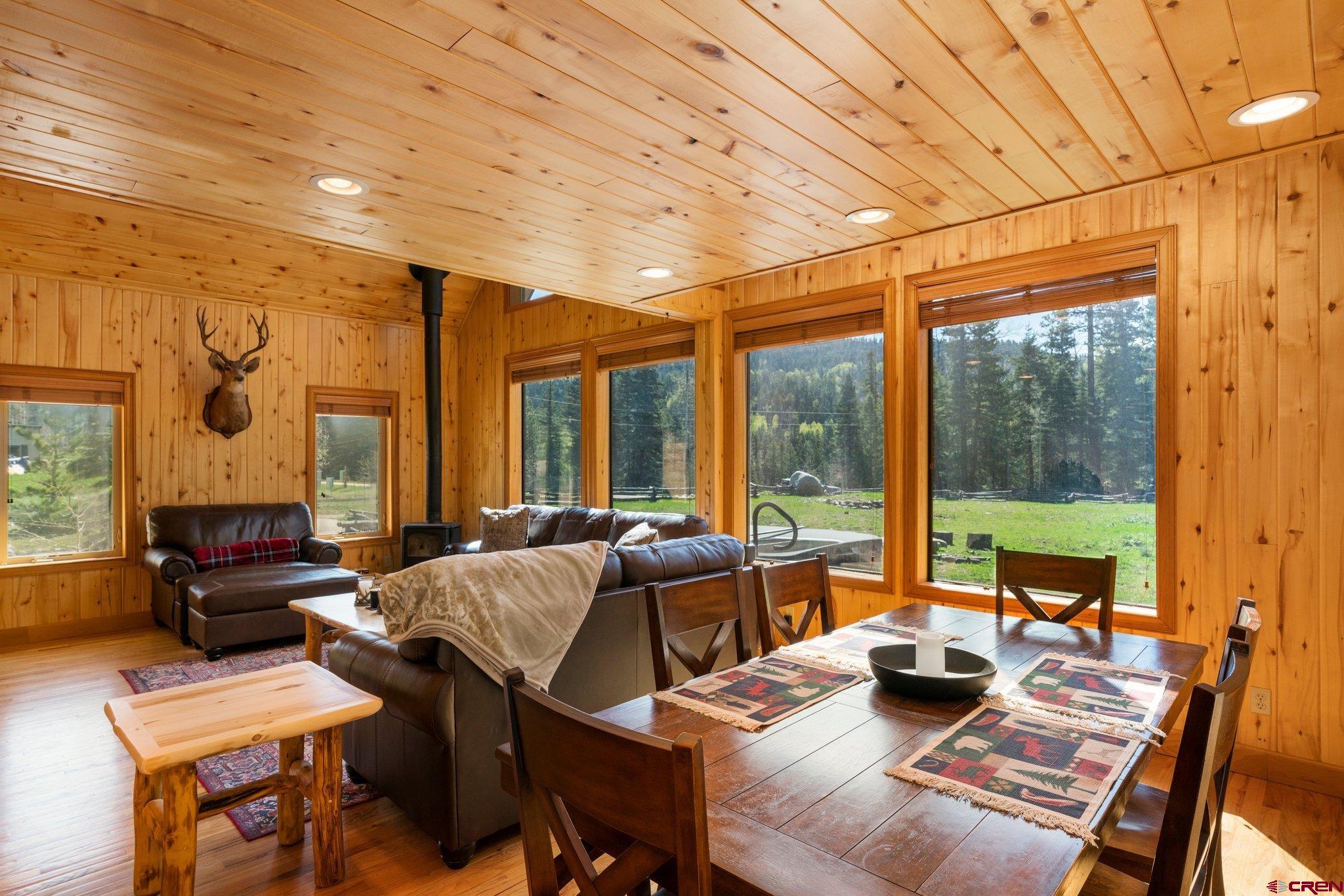 29 Eckart Lane Durango, CO 81301 - Photo 4 of 34 a living room with furniture and large windows