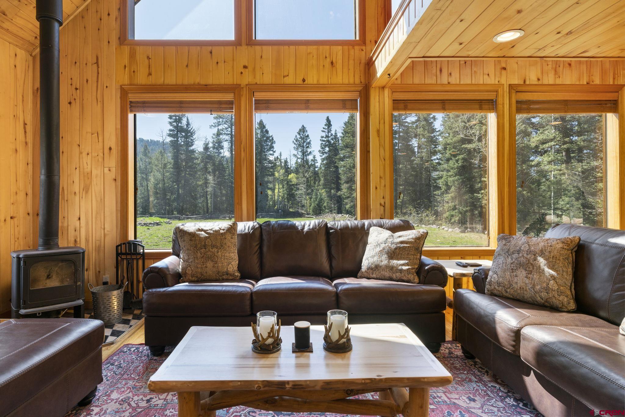 29 Eckart Lane Durango, CO 81301 - Photo 5 of 34 a living room with furniture a large window