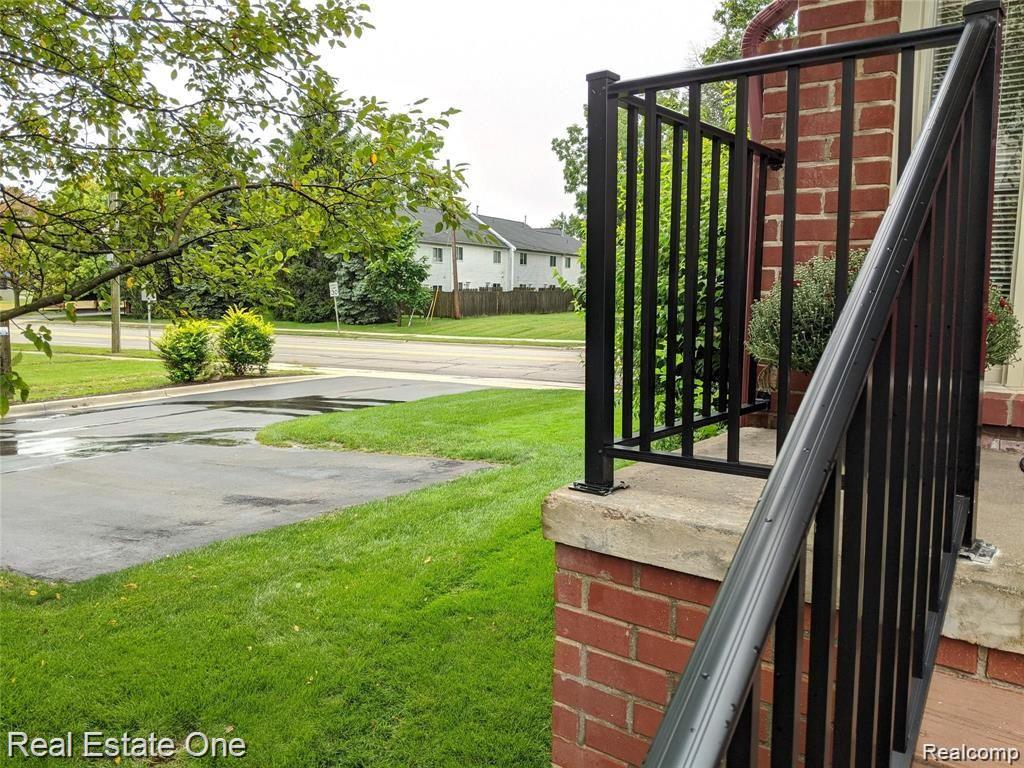 2650 Crooks Road, Unit 1 Royal Oak, MI 48073 - Photo 5 of 41 Extra parking spaces to the side of your end unit.