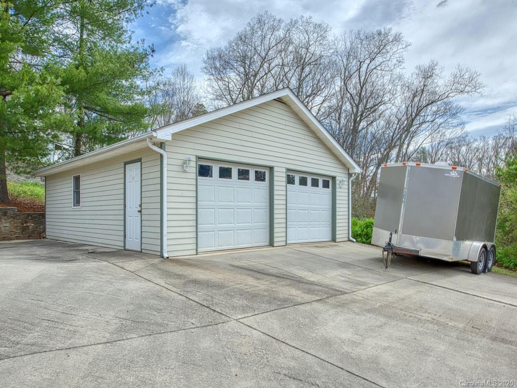 208 Oak Ridge Drive Clyde, NC 28721 - Photo 5 of 36 a view of a house with a garage