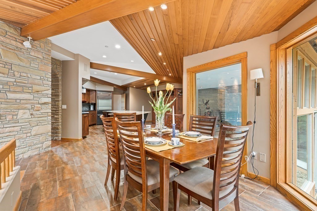 44 Sears Road Southborough, MA 01772 - Photo 14 of 41 a view of a dining room with furniture and wooden floor