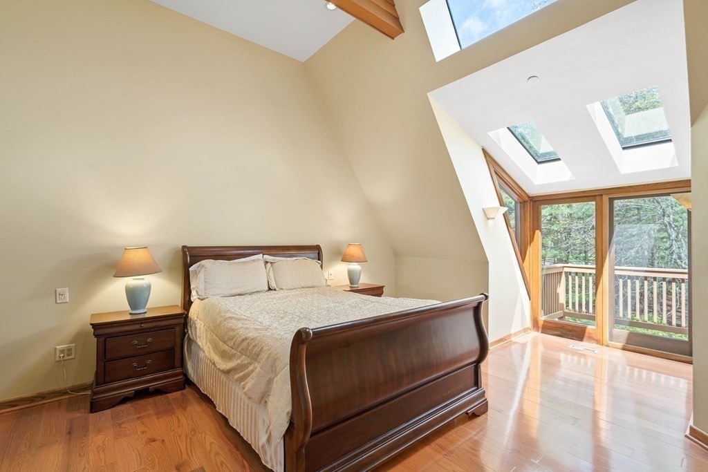 44 Sears Road Southborough, MA 01772 - Photo 24 of 41 a bedroom with a bed and a large window