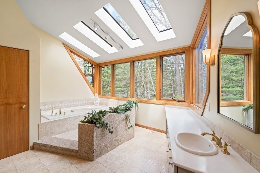 44 Sears Road Southborough, MA 01772 - Photo 27 of 41 a bathroom with a tub and large window