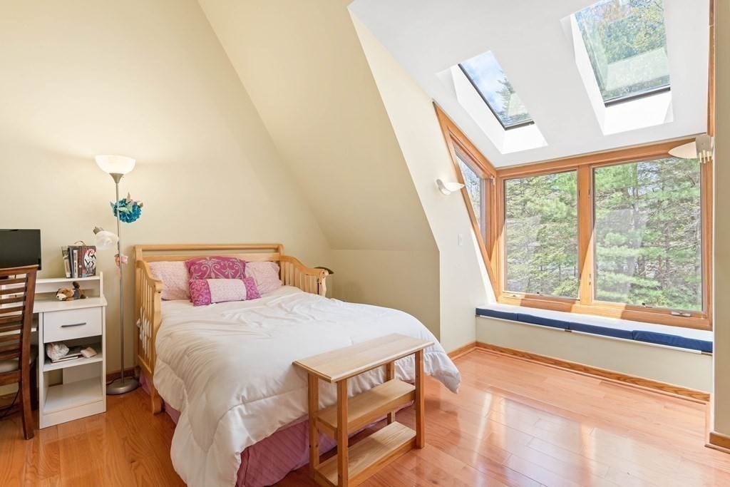 44 Sears Road Southborough, MA 01772 - Photo 29 of 41 a bedroom with a bed and a large window with the outer view