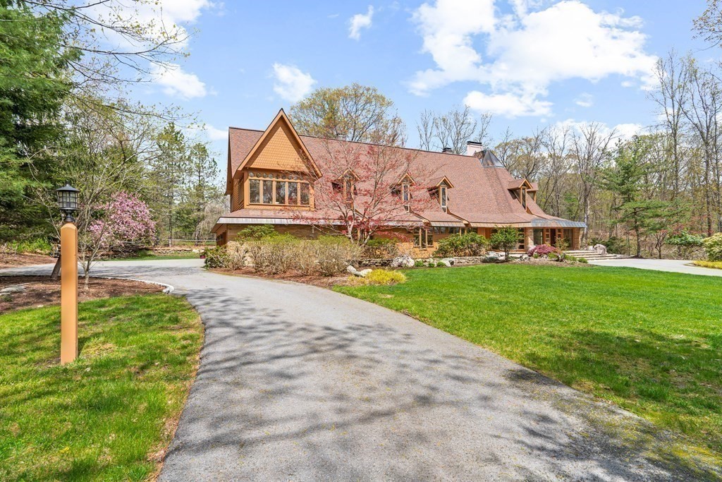 44 Sears Road Southborough, MA 01772 - Photo 40 of 41 a view of a big house with a big yard and large trees