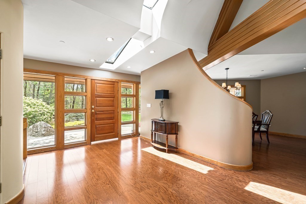 44 Sears Road Southborough, MA 01772 - Photo 4 of 41 a view of an empty room with wooden floor and a window