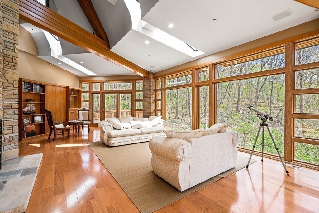 44 Sears Road Southborough, MA 01772 - Photo 7 of 41 a living room with furniture and floor to ceiling windows