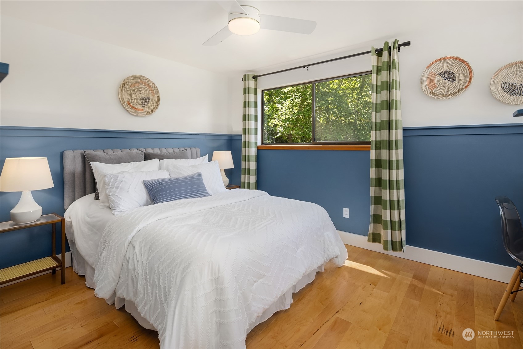 6024 Rose Loop Northeast Bainbridge Island, WA 98110 - Photo 18 of 40 a bedroom with a bed and window