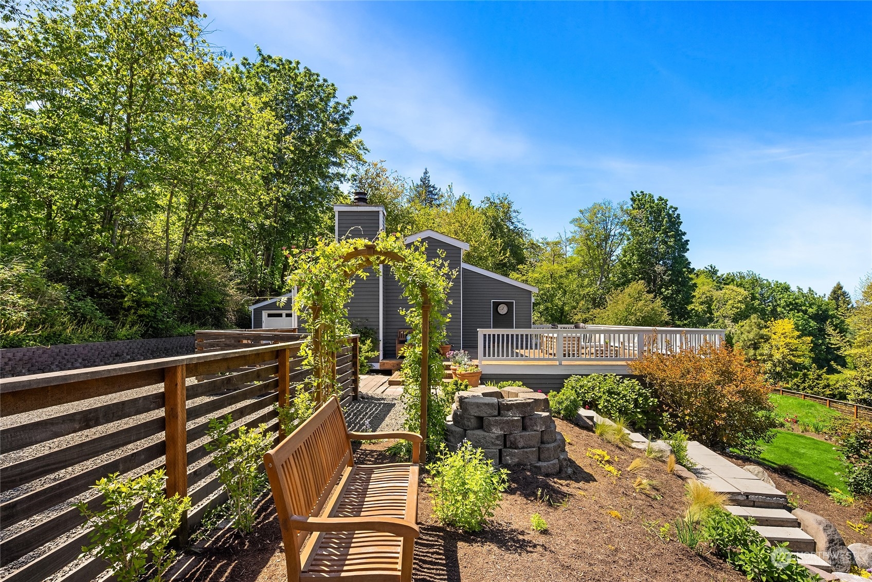 6024 Rose Loop Northeast Bainbridge Island, WA 98110 - Photo 28 of 40 a view of a balcony with plants