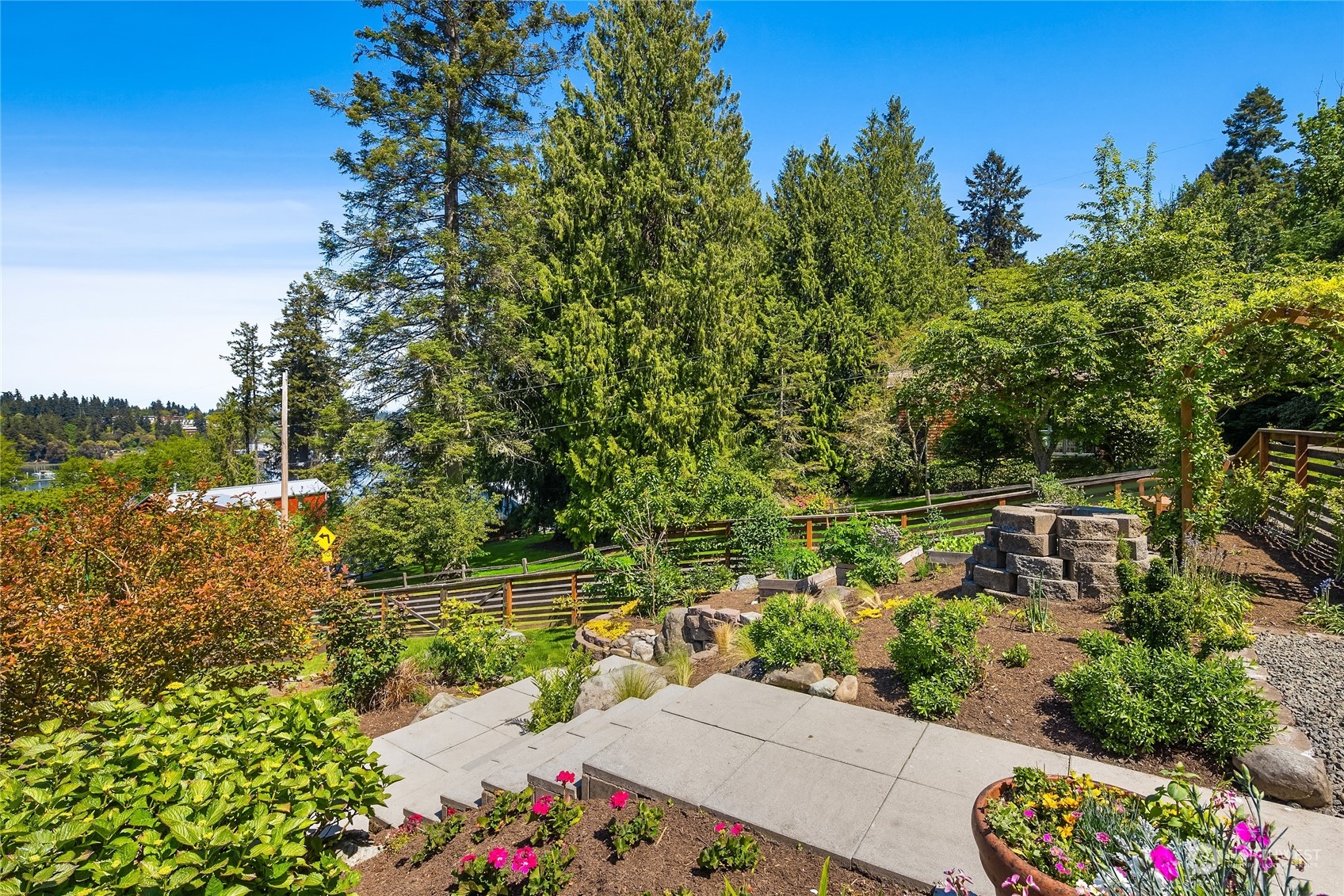 6024 Rose Loop Northeast Bainbridge Island, WA 98110 - Photo 30 of 40 a view of a lake with a city view
