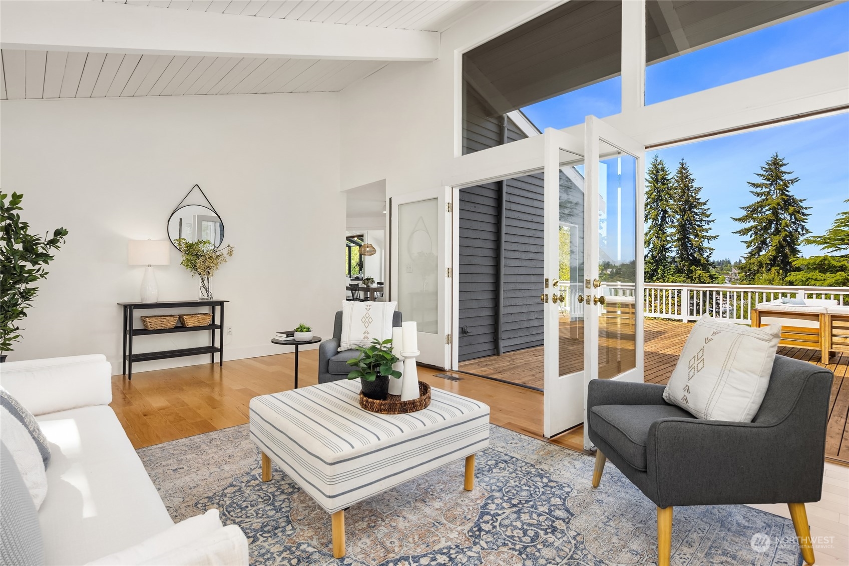 6024 Rose Loop Northeast Bainbridge Island, WA 98110 - Photo 3 of 40 a living room with furniture and a large window