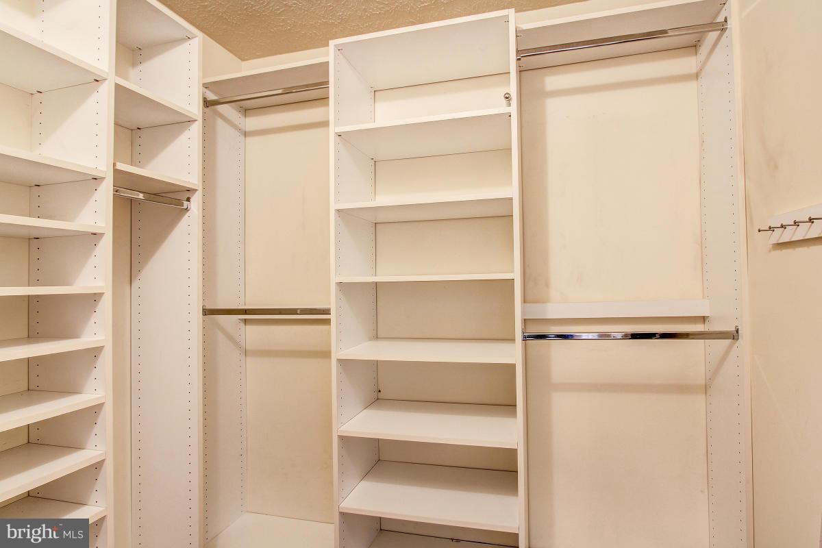 12501 Cross Country Lane Reston, VA 20191 - Photo 15 of 29 Closet Organizers add to efficient use of Closet