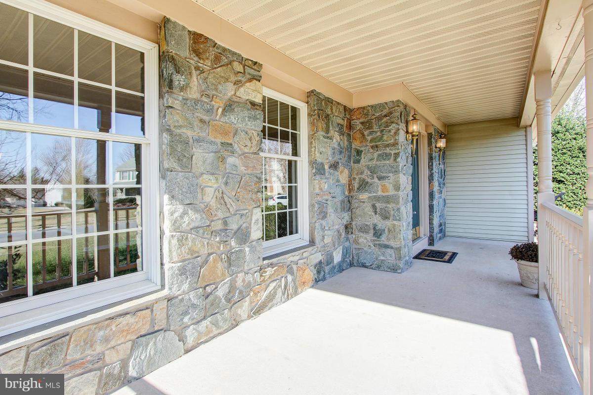12501 Cross Country Lane Reston, VA 20191 - Photo 3 of 29 Front Porch with Stone Accent Wall