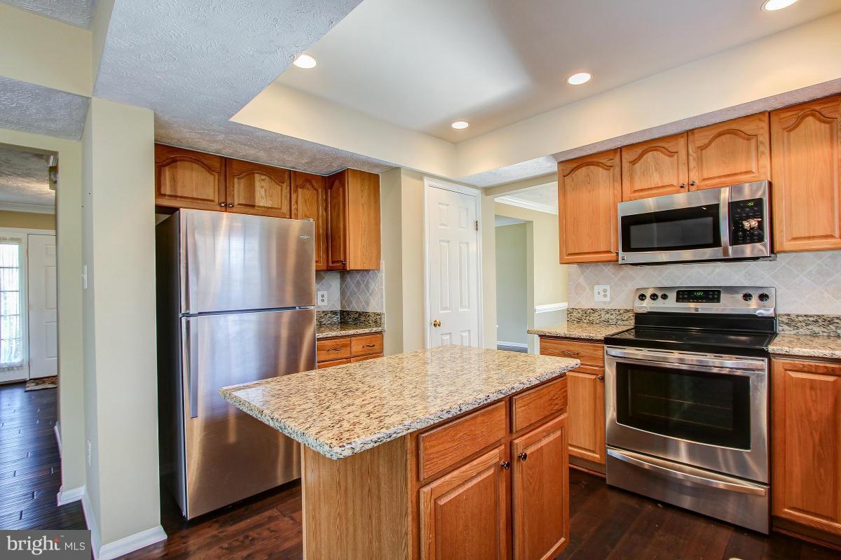 12501 Cross Country Lane Reston, VA 20191 - Photo 8 of 29 Recessed Lights create terrific working atmosphere