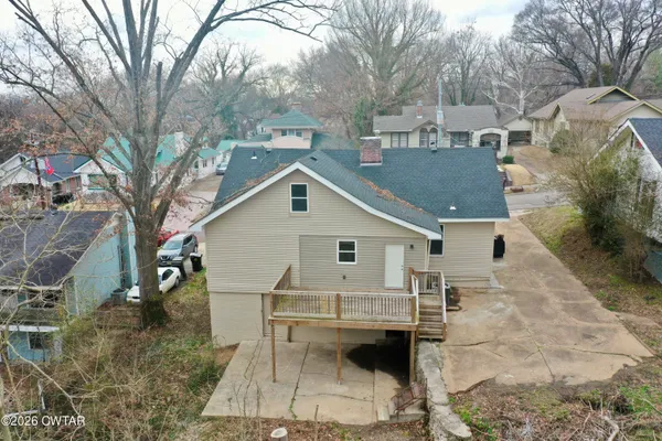 a view of house with a outdoor space