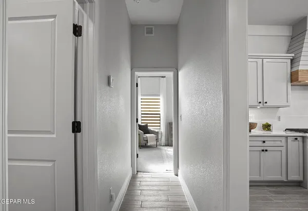 a view of a hallway and closet