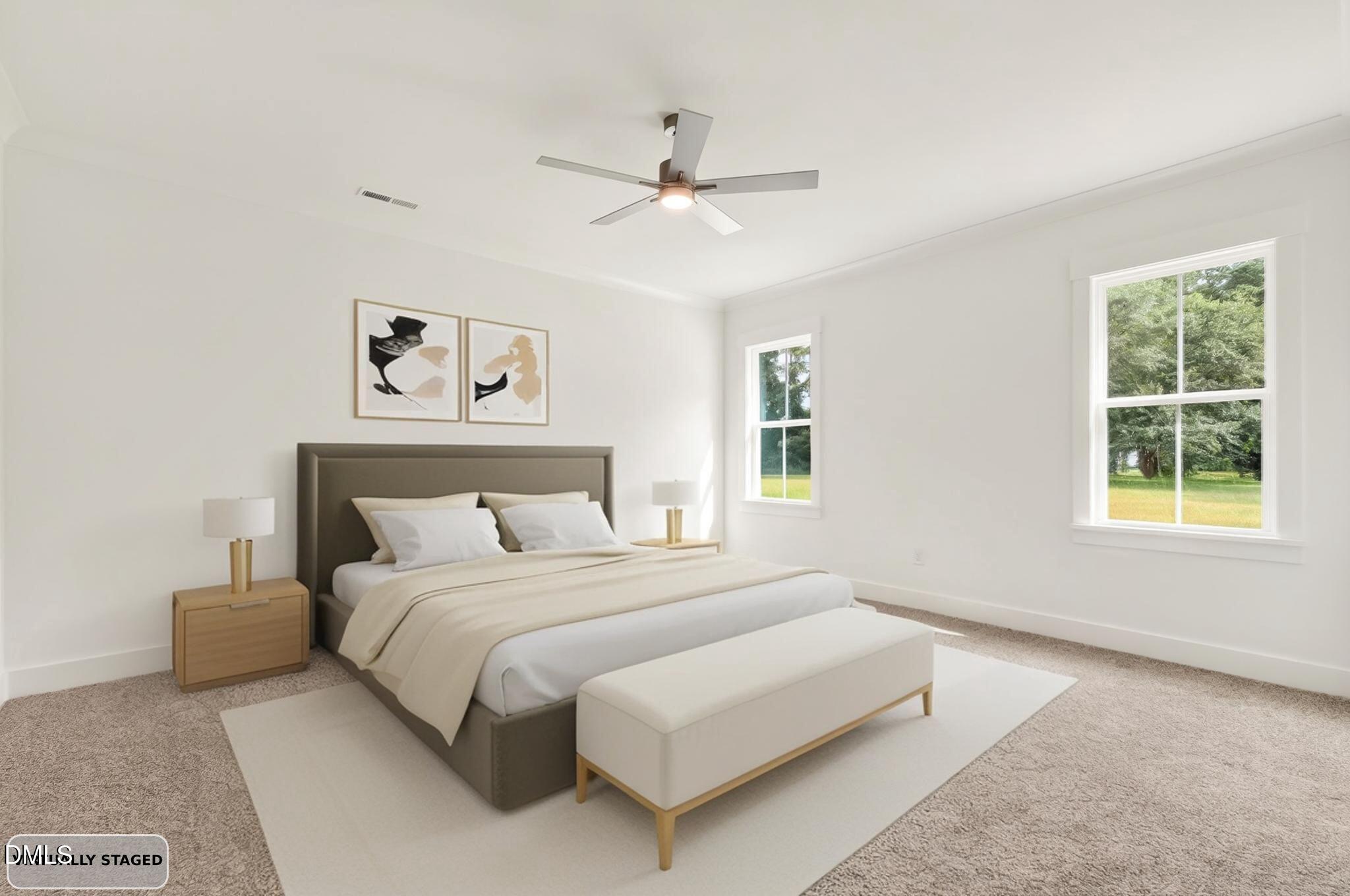 213 Maye Street Dunn, NC 28334 - Photo 21 of 45 a bedroom with a bed and a window
