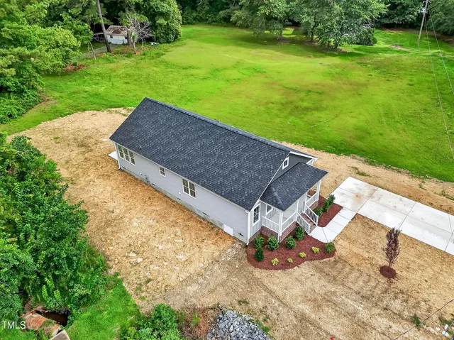 a view of a backyard with a garden