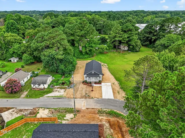 a view of a garden with an outdoor space