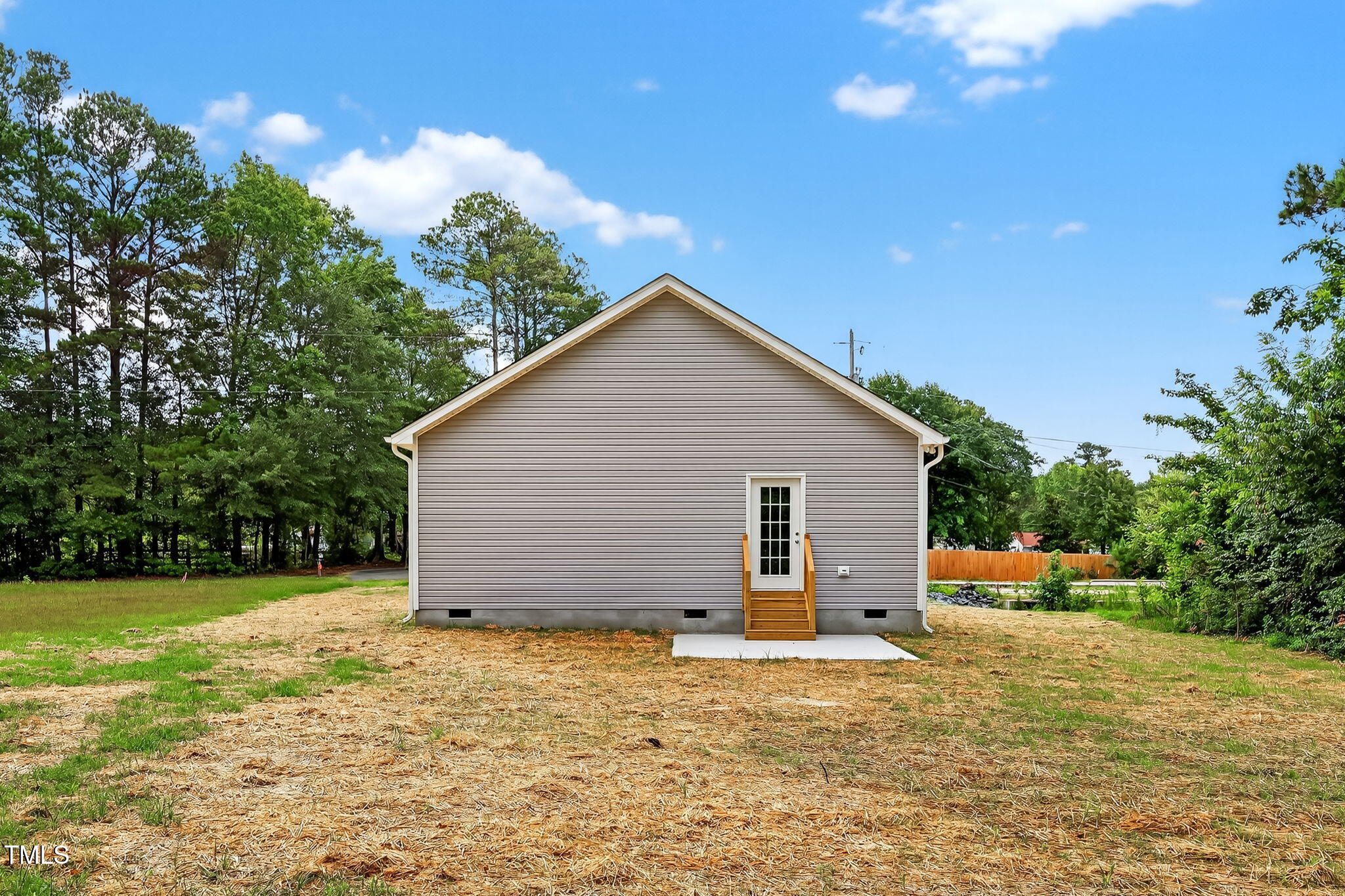 213 Maye Street Dunn, NC 28334 - Photo 41 of 45 a view of a house with backyard and garden