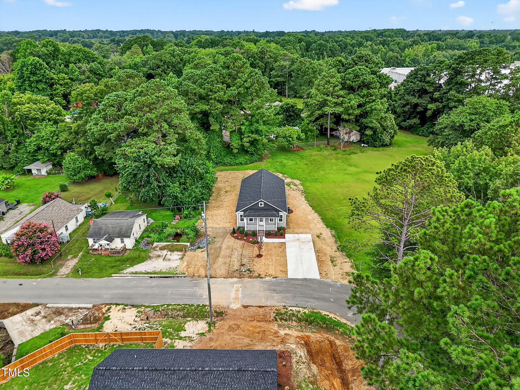213 Maye Street Dunn, NC 28334 - Photo 44 of 45 a view of a garden with an outdoor space