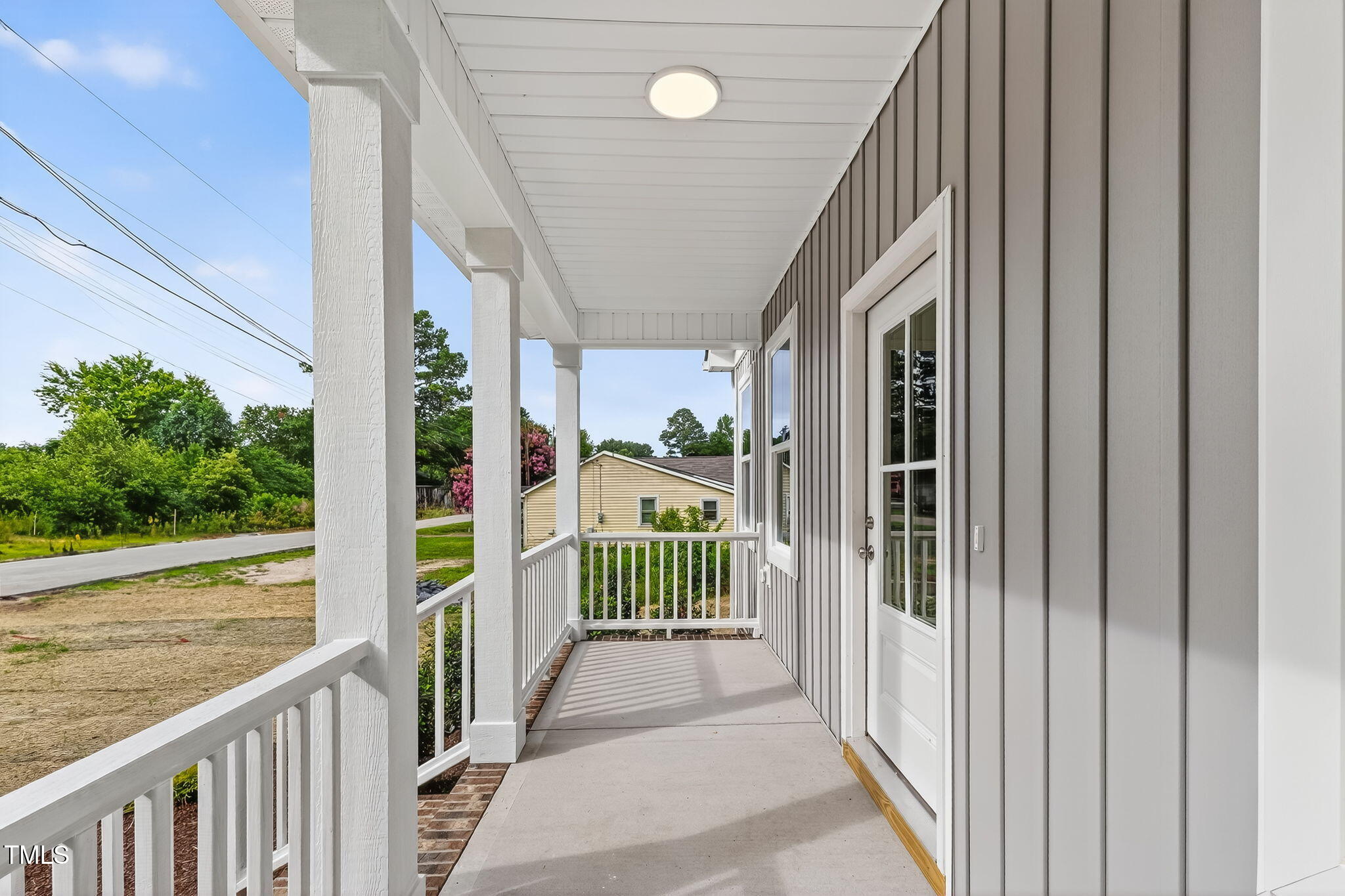 213 Maye Street Dunn, NC 28334 - Photo 8 of 45 a view of a porch