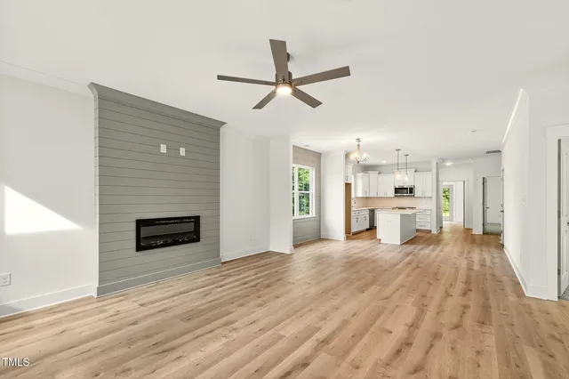 a view of a kitchen with microwave and a stove