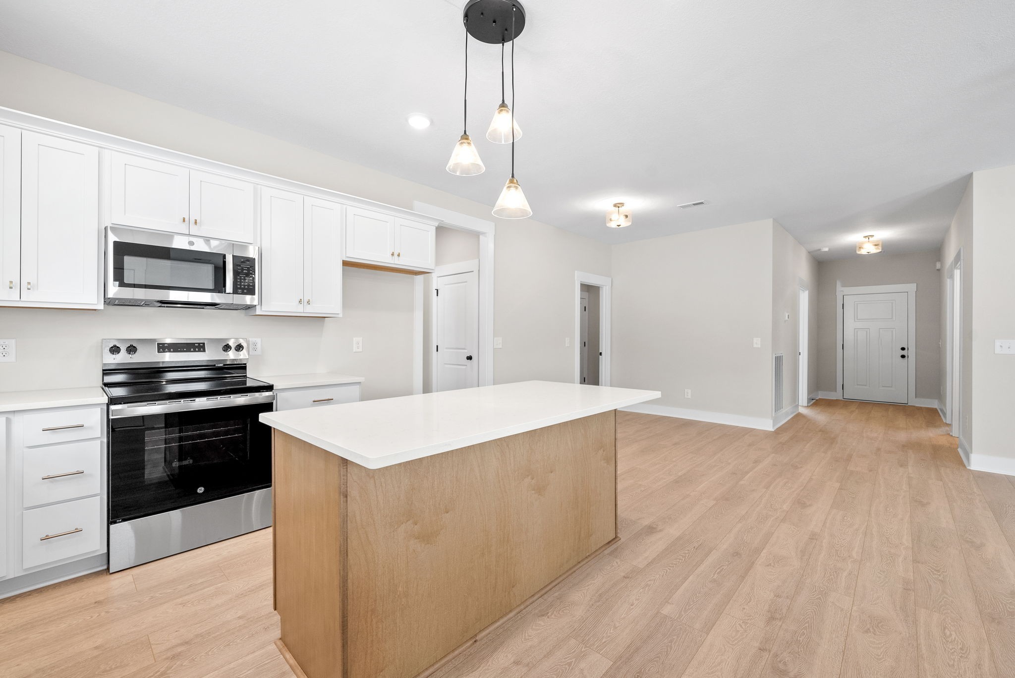 217 Wayne Hall Road Clarksville, TN 37040 - Photo 17 of 36 a kitchen with stainless steel appliances kitchen island a sink dishwasher a refrigerator and a stove