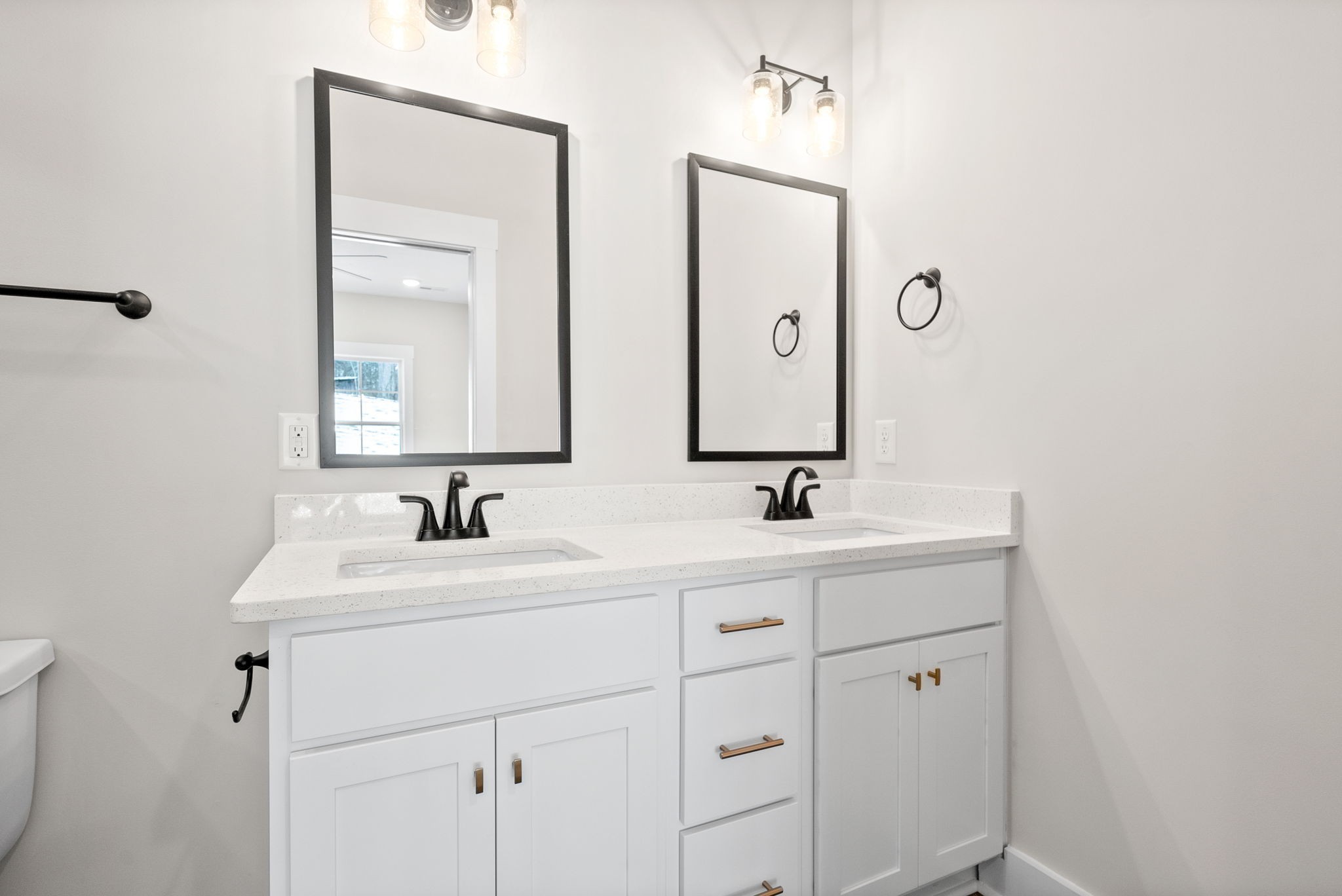 217 Wayne Hall Road Clarksville, TN 37040 - Photo 22 of 36 a bathroom with a double vanity sink and mirror