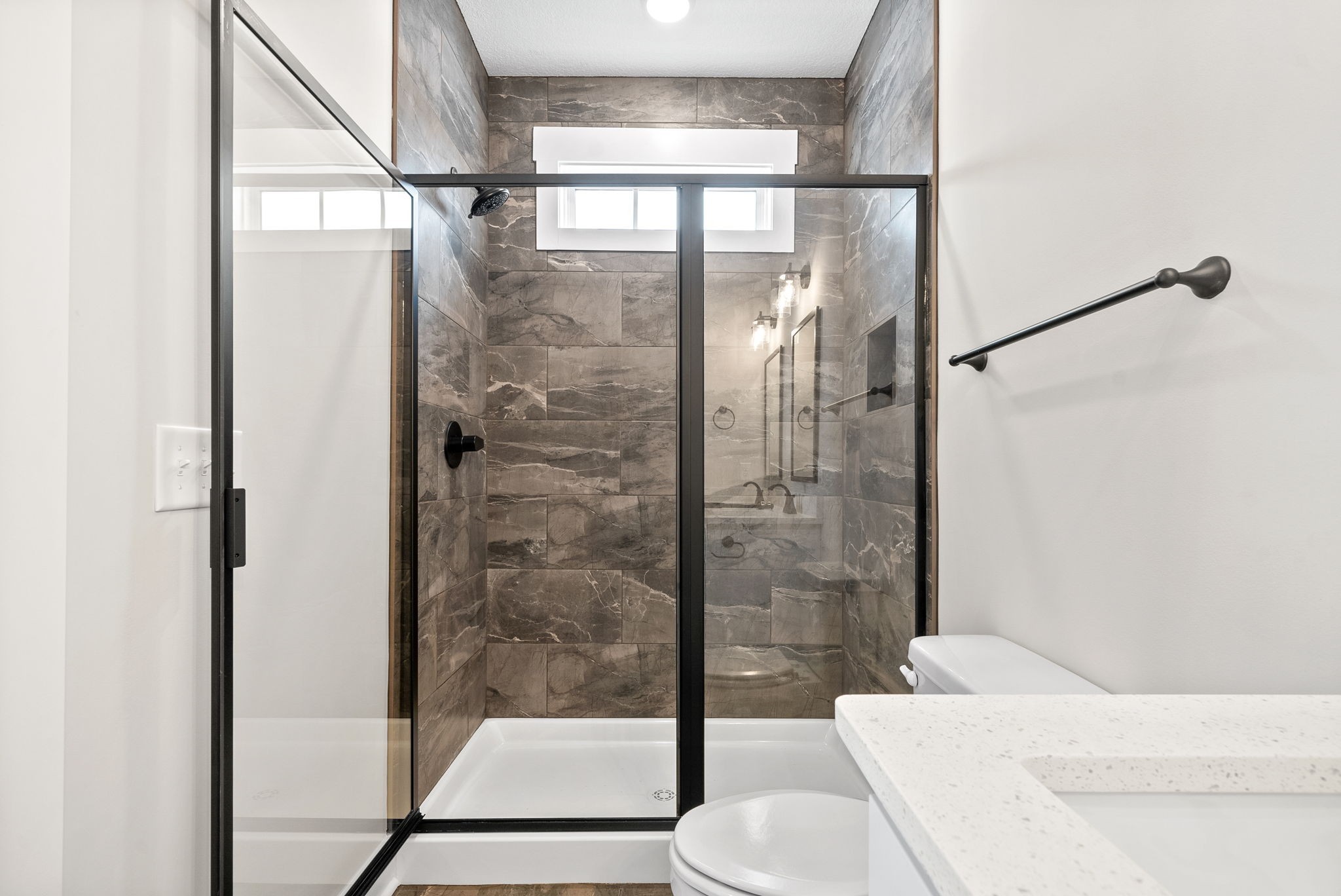 217 Wayne Hall Road Clarksville, TN 37040 - Photo 24 of 36 a bathroom with a shower and a toilet in it