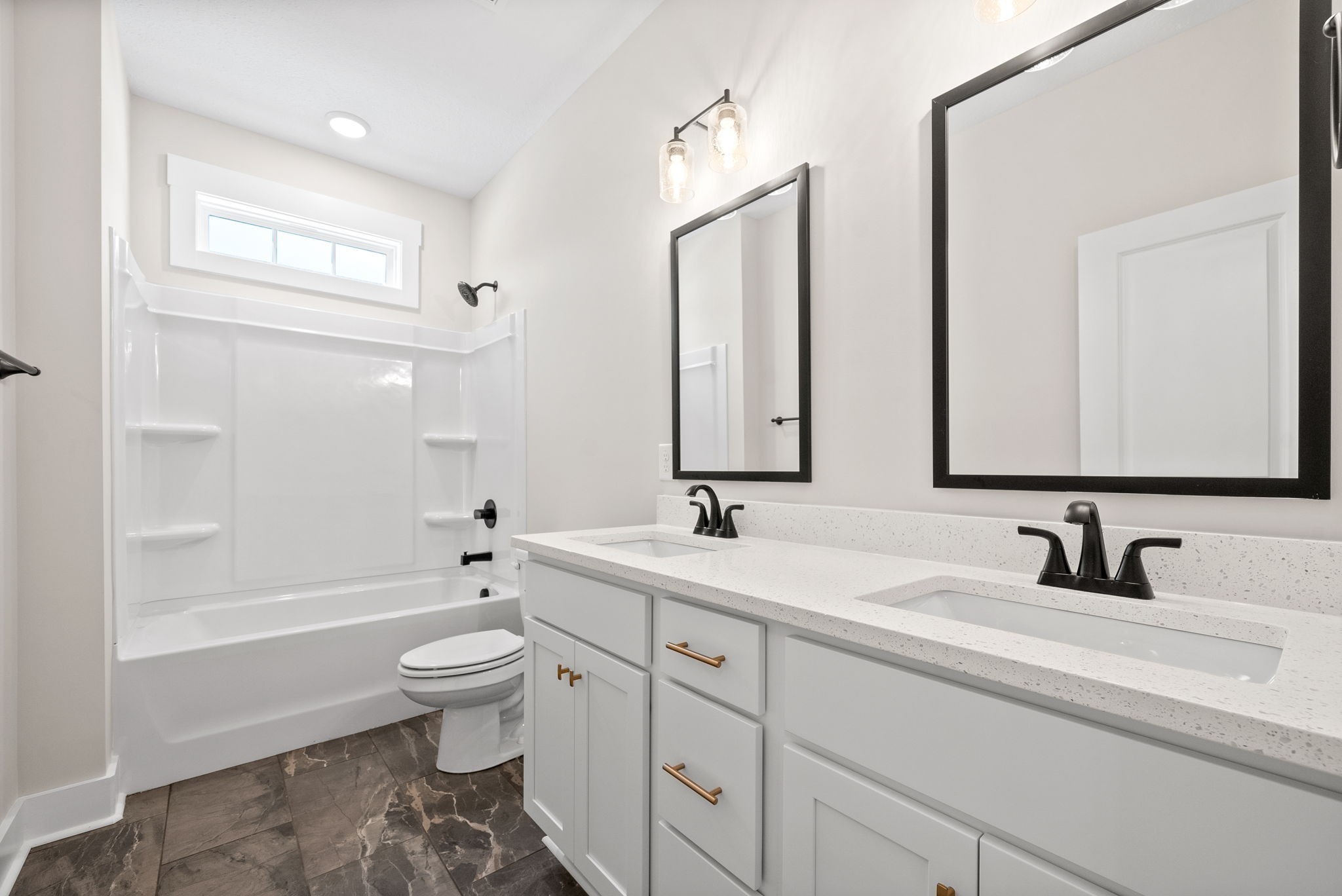 217 Wayne Hall Road Clarksville, TN 37040 - Photo 28 of 36 a bathroom with a double vanity sink toilet mirror and bathtub