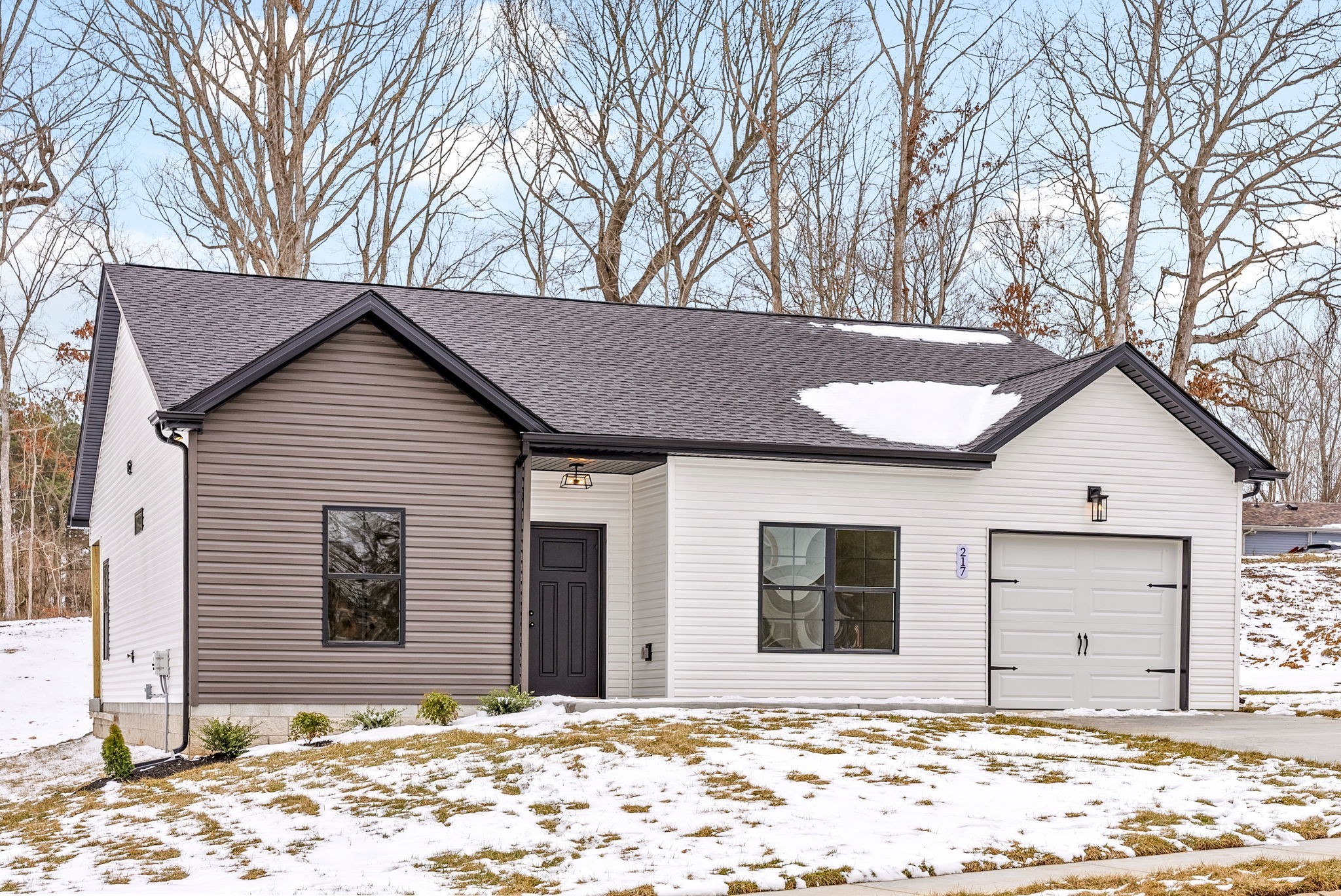 217 Wayne Hall Road Clarksville, TN 37040 - Photo 3 of 36 a front view of a house with a yard