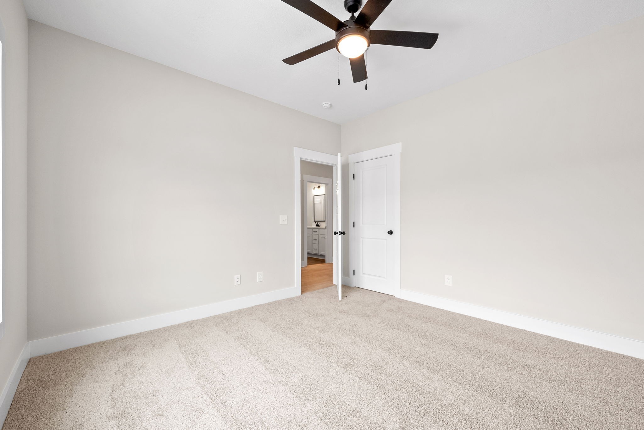 217 Wayne Hall Road Clarksville, TN 37040 - Photo 31 of 36 an empty room with a ceiling fan and window