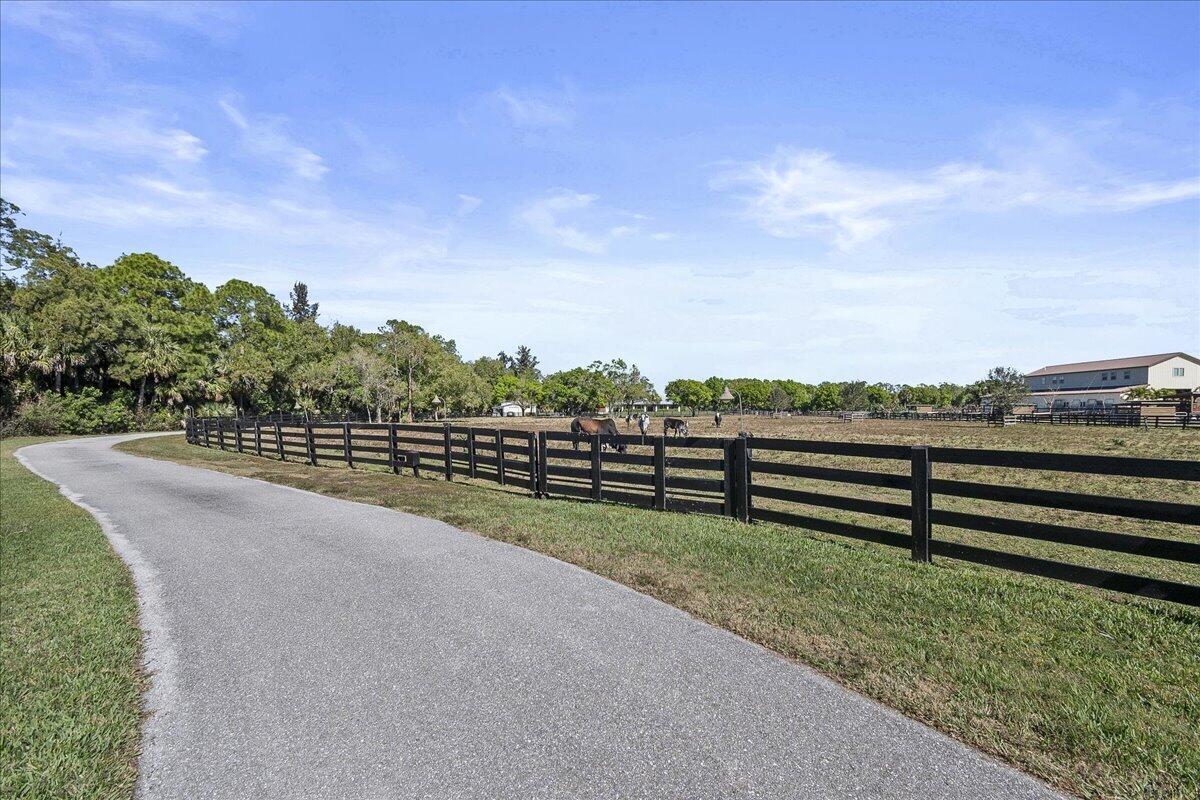 10975 Randolph Siding Road Jupiter, FL 33478 - Photo 5 of 97 a view of outdoor space and yard