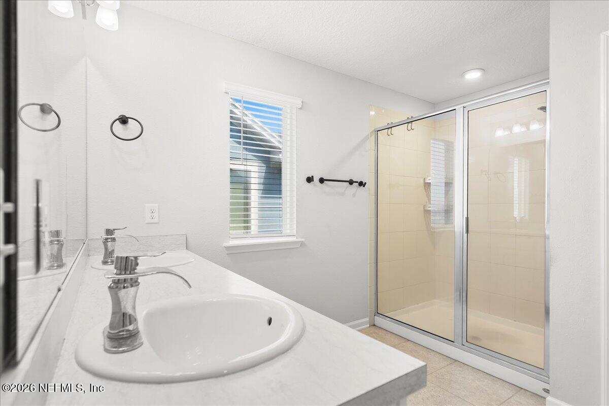 5645 Hampton Creek Road Jacksonville, FL 32218 - Photo 33 of 41 Owners Suite Walk-In Shower
