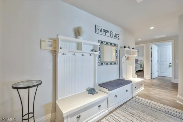 a spacious bathroom with a double vanity sink and a mirror