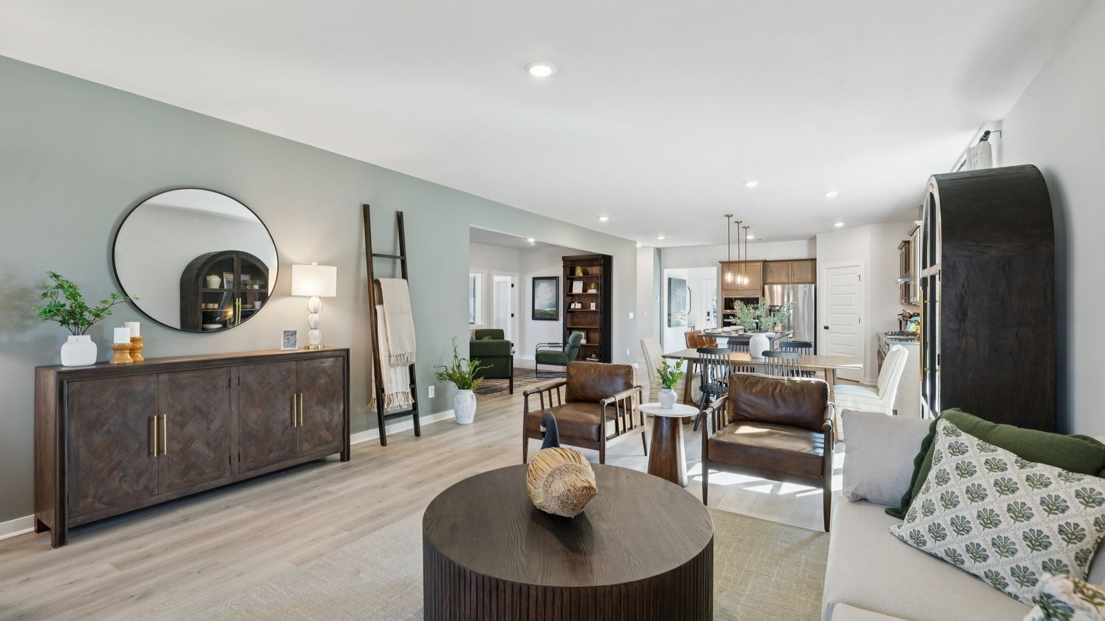305 Harvest Point Boulevard Spring Hill, TN 37174 - Photo 13 of 48 a living room with furniture and a wooden floor