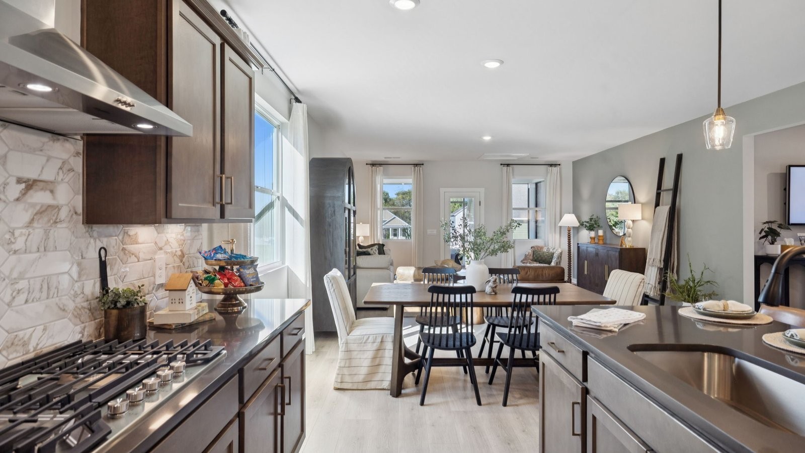 305 Harvest Point Boulevard Spring Hill, TN 37174 - Photo 22 of 48 a kitchen with a table and chairs in it