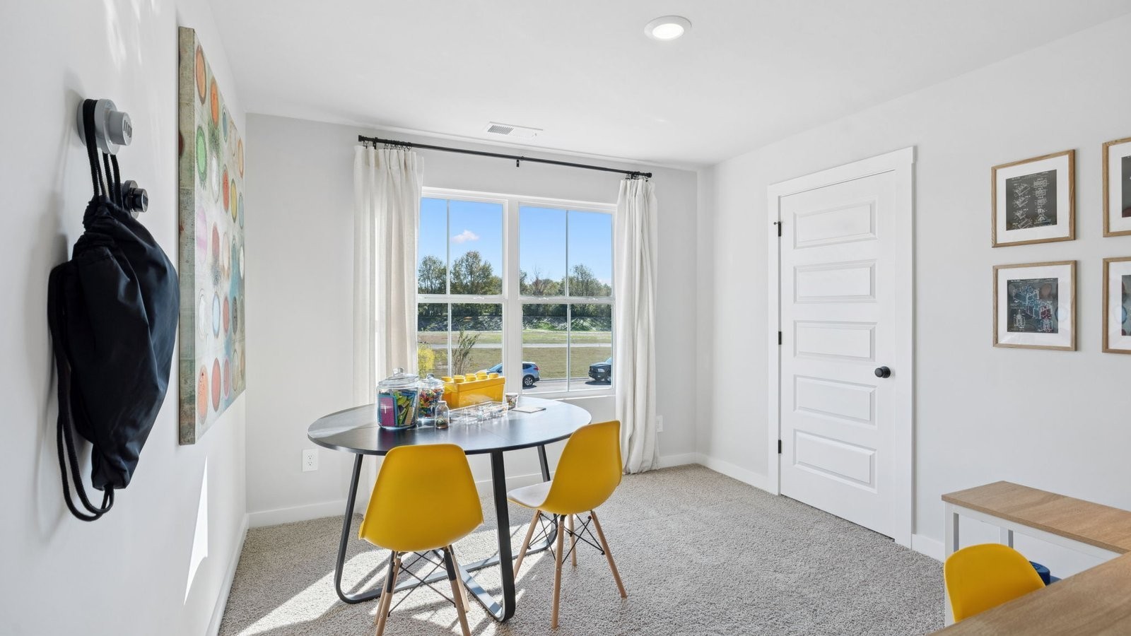 305 Harvest Point Boulevard Spring Hill, TN 37174 - Photo 29 of 48 a living room with furniture and a flat screen tv