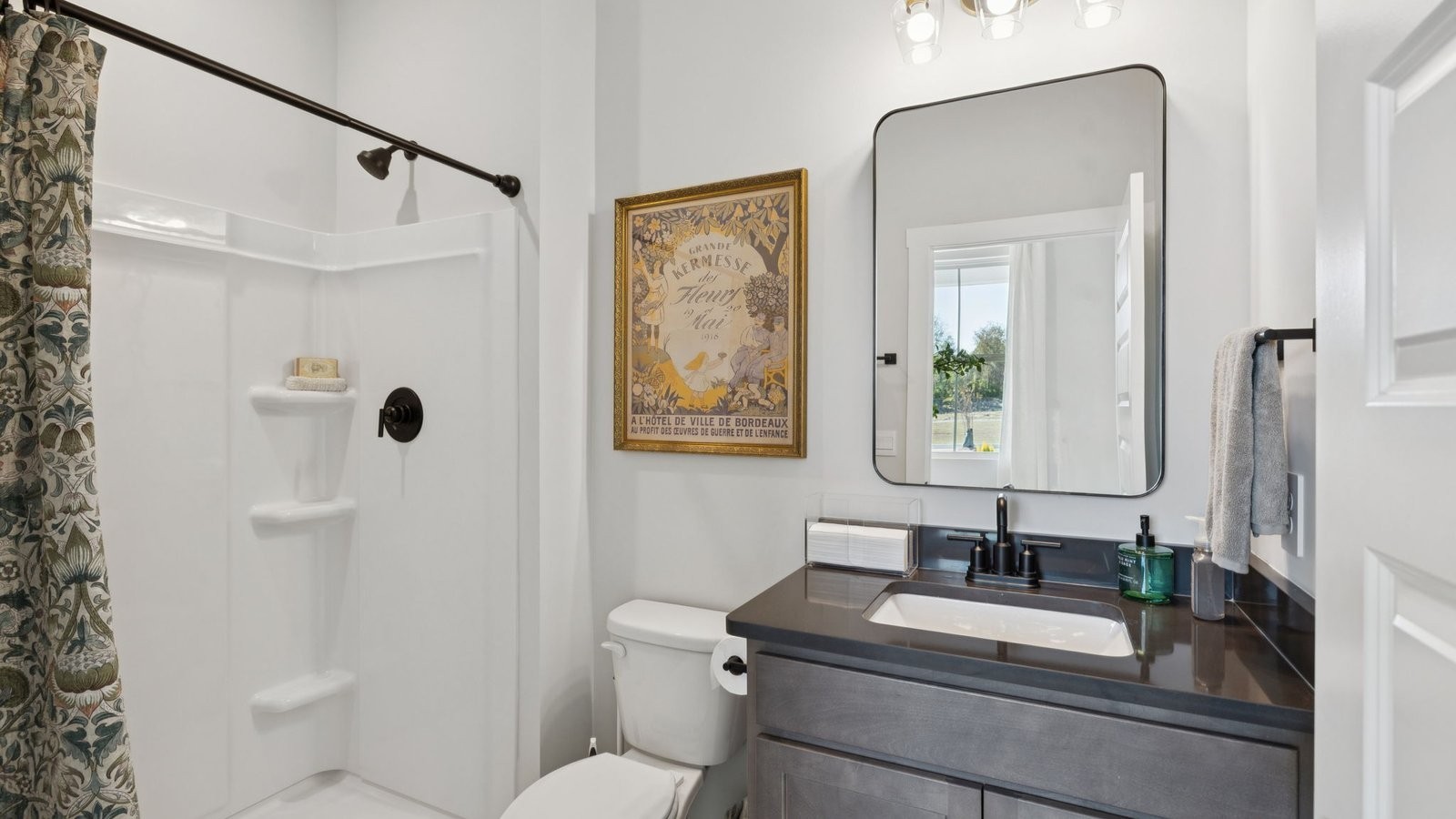 305 Harvest Point Boulevard Spring Hill, TN 37174 - Photo 30 of 48 a bathroom with a granite countertop sink mirror vanity and toilet